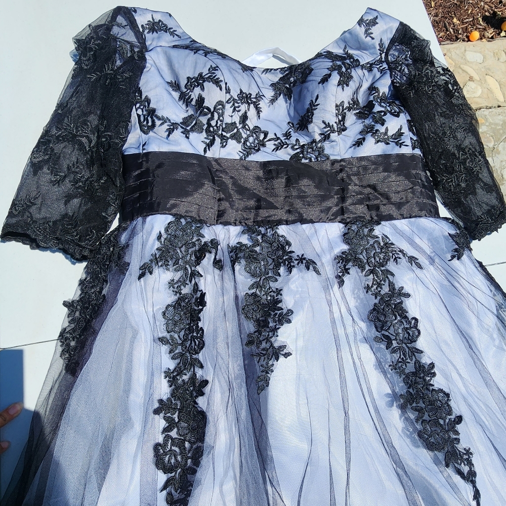 Black and white formal tulle A-line dress. Used good some flaws.